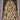 Oriental handmade silk rug on floor showing full layout and pattern.
