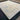 Pastel tone Turkish Oushak rug displayed in bedroom setting