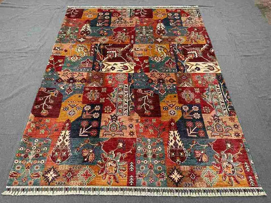 5x7 handmade patchwork wool rug displayed in living room