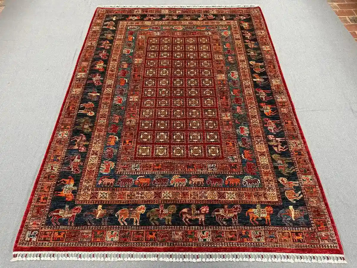Authentic Pazyryk rug on floor in living room – tribal decor style