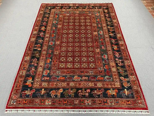 Authentic Pazyryk rug on floor in living room – tribal decor style