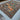Floor view of traditional handmade Persian rug with storytelling motifs