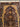 Close-up of intricate floral bird motif on Persian silk rug