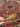 Handmade Persian silk rug 3x5 ft held in hands showing intricate medallion design