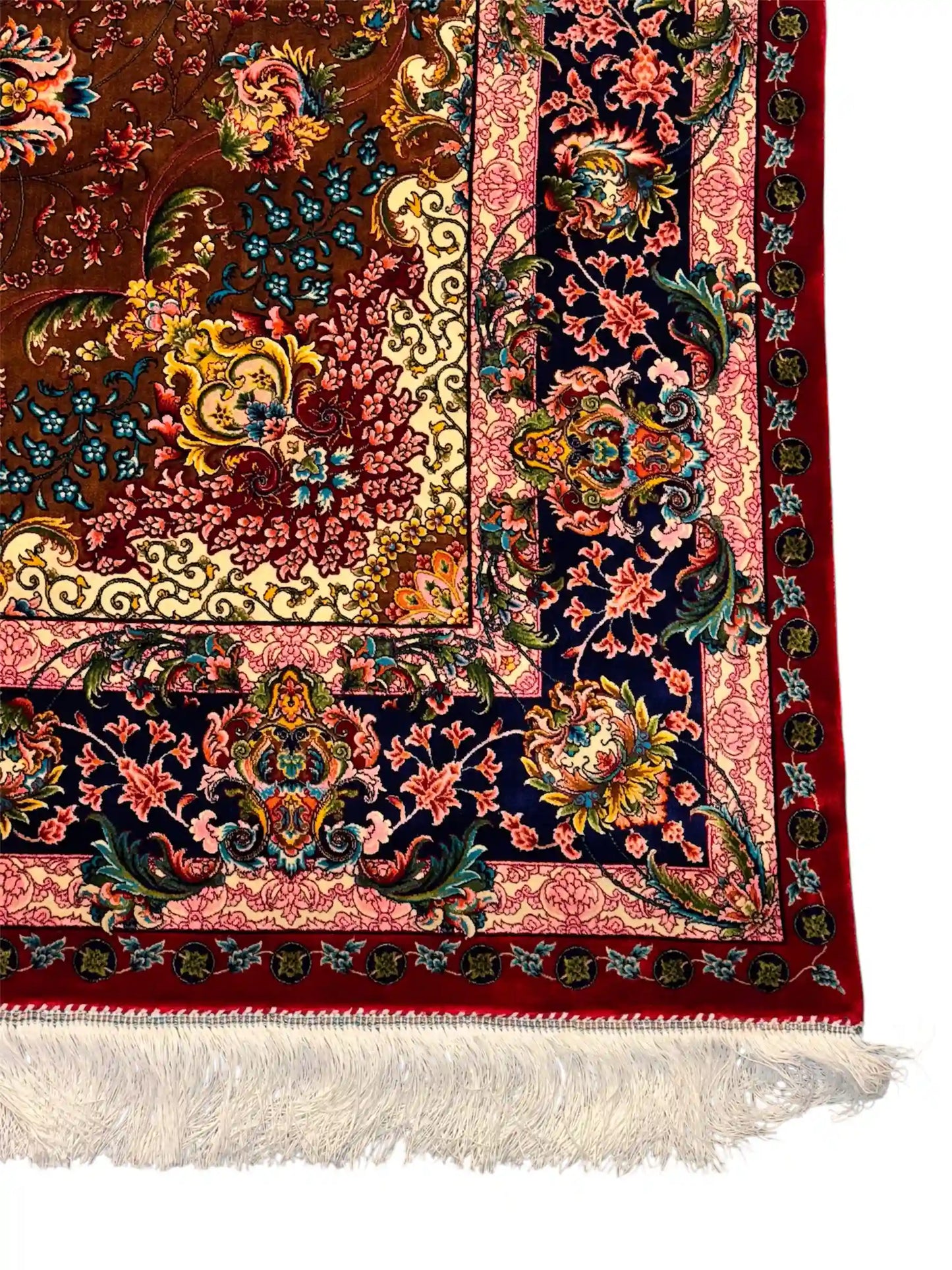 Corner detail of 5x7 Persian silk area rug – floral medallion pattern