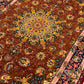 Close-up of handmade Persian silk rug – soft wool-silk pile texture