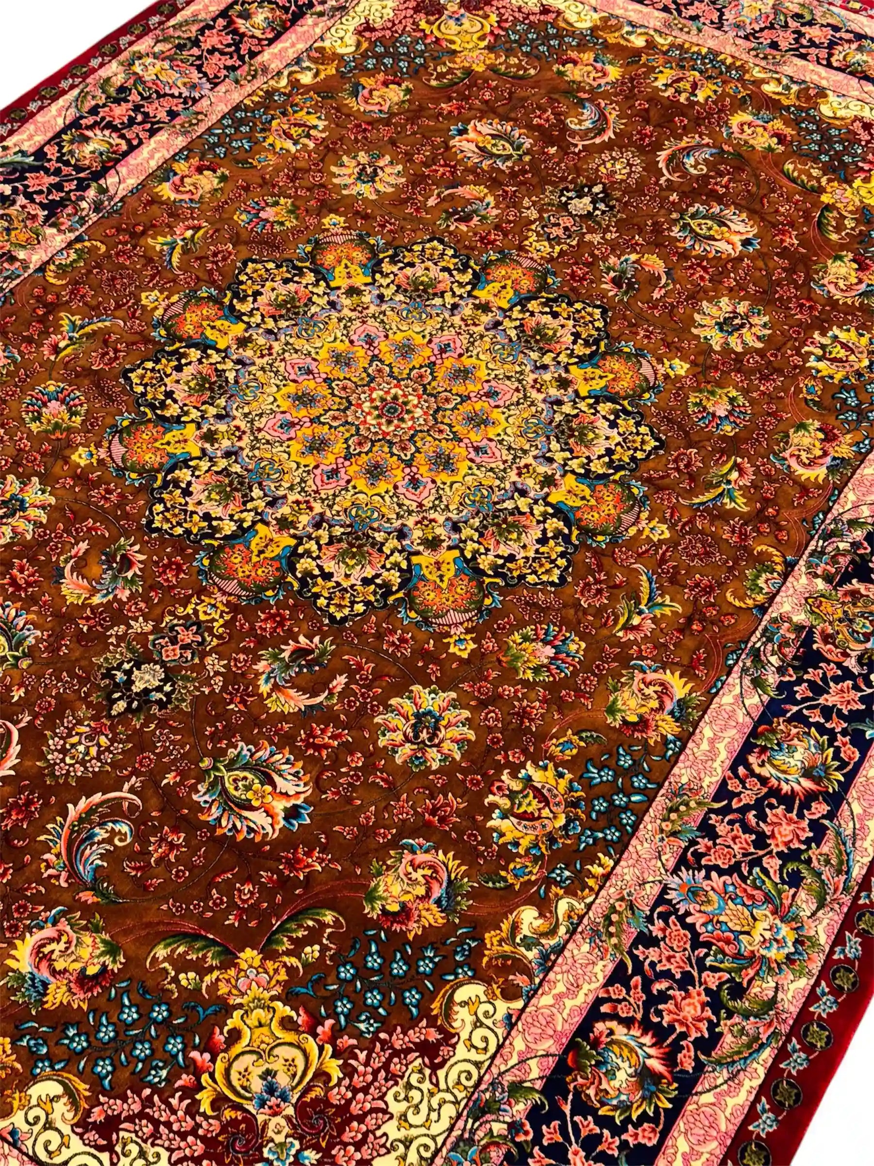 Close-up of handmade Persian silk rug – soft wool-silk pile texture