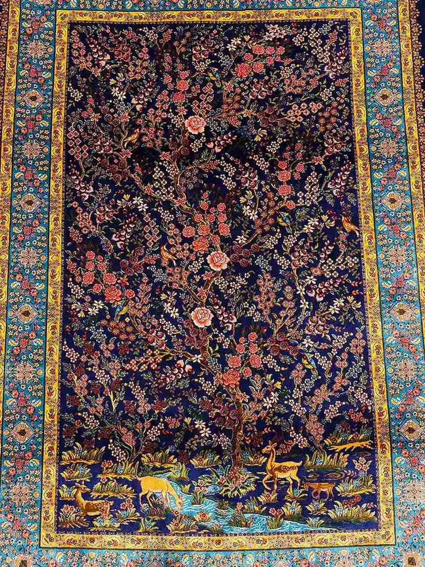 Close-up of deer motif on Persian Garden Silk Rug