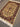  Side angle of handmade Persian silk rug on wooden floor