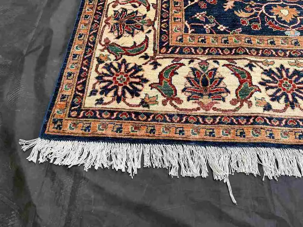 Corner detail of Persian-style handmade Chobi rug