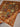 old detail of hand-knotted Persian-style patchwork rug