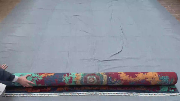 Video showcasing the rich texture and intricate hand-knotted wool on silk weave of the 7x10 multicolor Mamluk Oriental rug, with vibrant modern design.