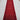 Red Afghan wool runner rug placed on wooden floor