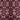 Close-up of red and beige Afghan wool silk rug with geometric pattern