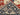 Folded view of Red & Blue Heriz wool rug showing thickness and texture