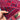 Red & Blue Khamiyaab runner held in hands showing wool texture