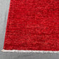 Close-up of knotted weave on Red Gabbeh Wool Rug – Persian design