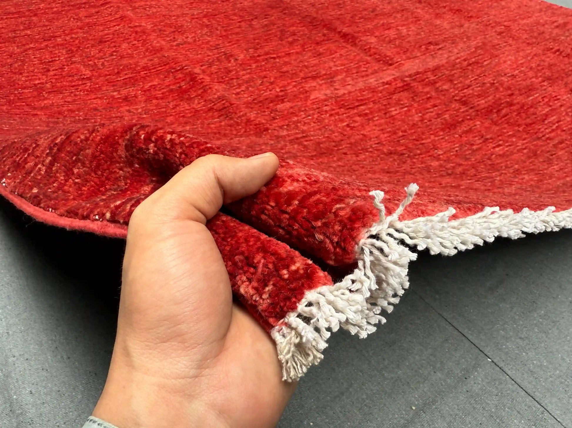 Authentic Persian Wool Gabbeh Rug in-hand view – 6.6x9.7 ft