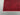 Corner detail of handmade red Gabbeh rug – geometric pattern and texture