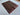 Red and green Persian rug styled on floor in modern interior