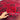 Handmade Red Kalisa Wool Rug held in hands – front detail view