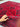 Handmade Red Kalisa Wool Rug held in hands – front detail view