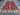  Interior view with handmade Kazakh rug – geometric red wool silk