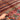 5x8 Red Khorjin Rug held in hands – Handmade Persian wool carpet