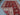Folded view showcasing thickness of red Oriental Turkish rug