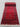 Folded view of handmade Oriental runner rug revealing wool texture and knotting