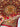 Handmade Red Silk Wall Rug Held in Hands – Front View