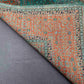Backside and folded detail of 6x8 hand-knotted Mamluk wool rug