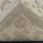 Back view of folded Ziegler rug showing fine knotted craftsmanship