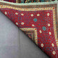 Backside of folded 6x8 red and teal Mamluk wool & silk rug