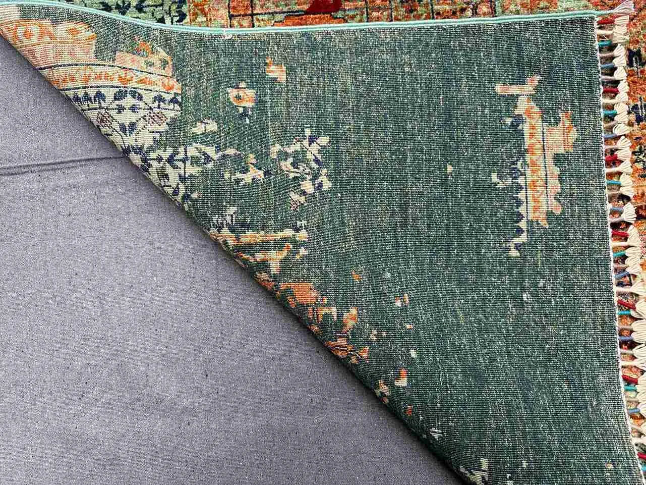 Fold showing knotted handmade wool and silk Mamluk rug