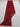 Folded view of red 3x13 handmade hallway rug revealing intricate knotting