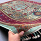 6x8 rustic Turkish Mamluk rug in red and teal held in hand