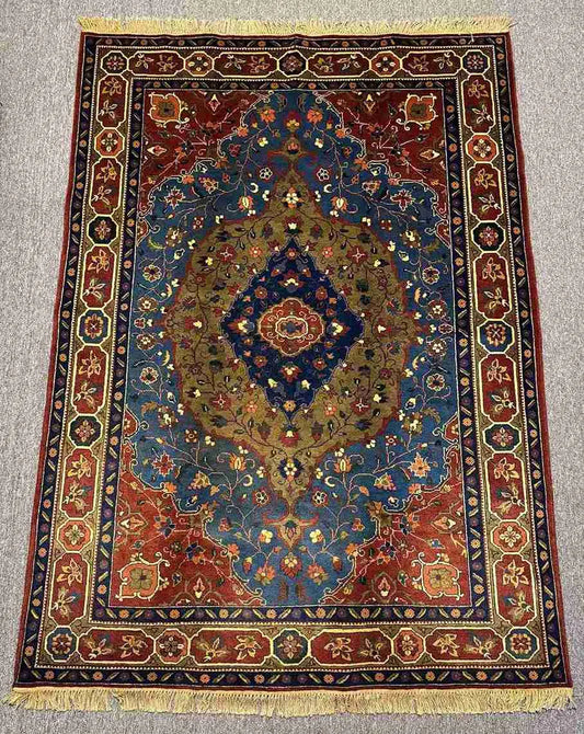 Full view of 5x7 Samarkand Tabriz rug placed on hardwood floor