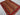 Side angle view of handmade Art Deco stripe wool rug