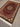 Angled view of silk Persian carpet on the floor