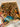 Handmade silk wall rug 2x3 ft – in-hand view showing fine weave and vibrant colors