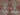 Corner detail of red and blue Sultani wool rug – Oriental design