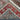 Folded edge of handmade wool Sultani rug showing weave and quality