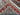 Folded edge of handmade wool Sultani rug showing weave and quality