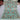 Full top-down view of Sultani handmade rug in aqua, red, and gold