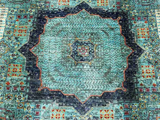 Close-up showing wool and silk texture of Mamluk area rug