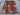 Traditional floor layout using a colorful kilim-style patchwork rug