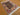 Tree of Life oriental carpet on hardwood flooring
