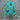 Full view of Tree of Life wool rug in turquoise blue on floor
