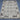Floor view of tribal patterned wool Kilim rug in monochrome colors
